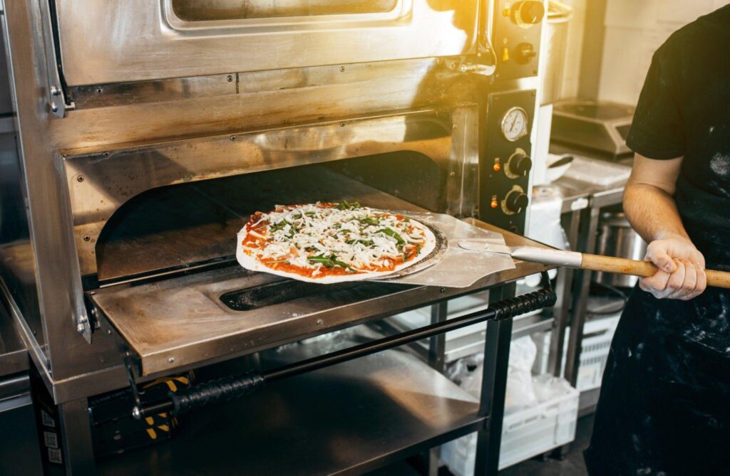 Achieving Cooked Pizza with a Traeger Pizza Oven Hack